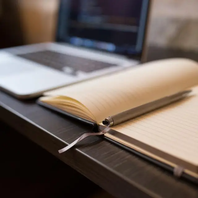 Lined notebook with ribbon marker