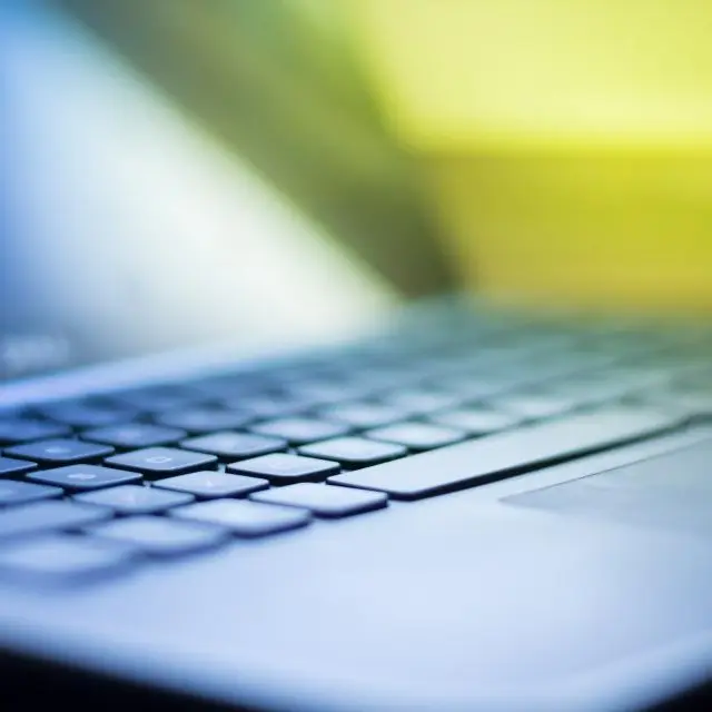 Laptop with low-profile keyboard
