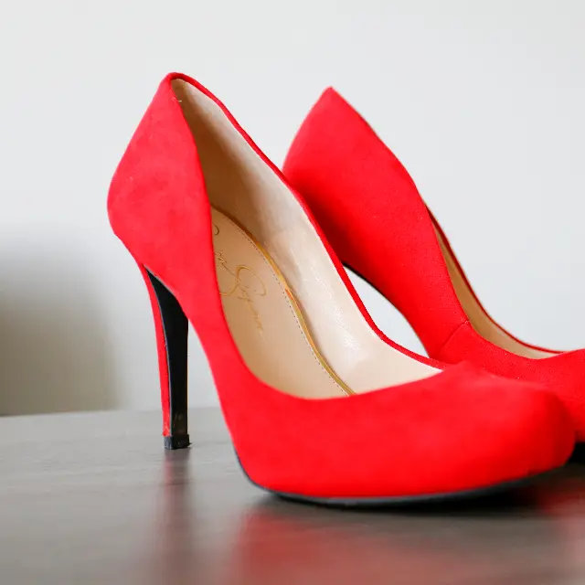 Red suede pumps