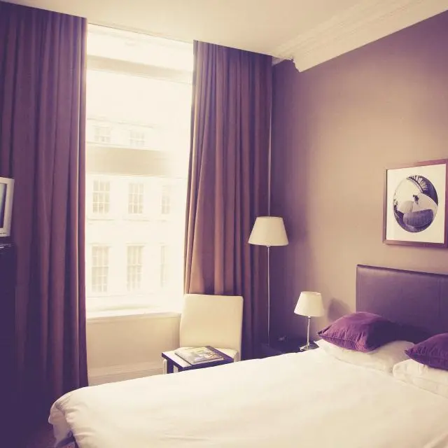 Double bed with dark headboard