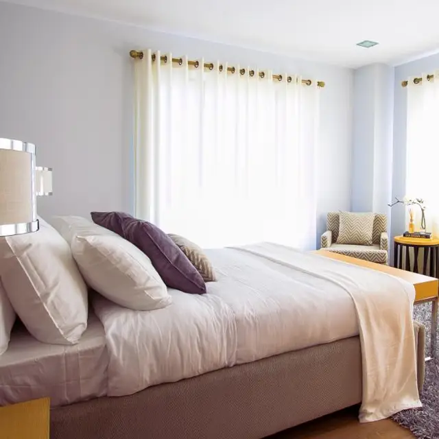Beige upholstered bed