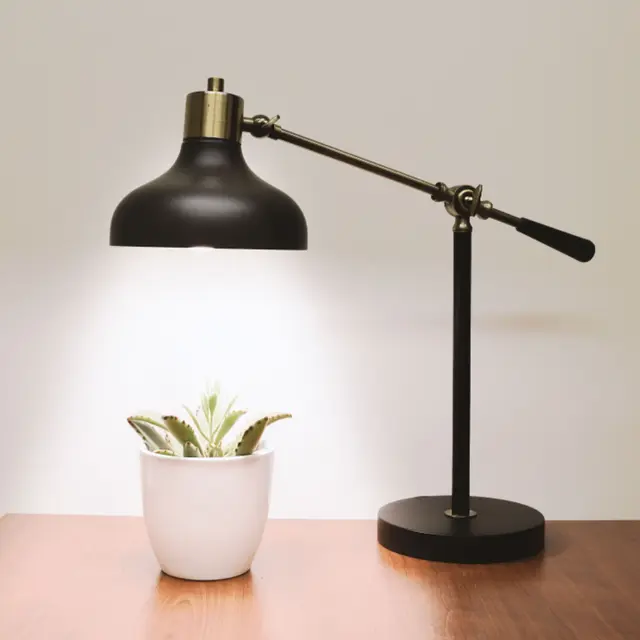 Black and brass adjustable lamp
