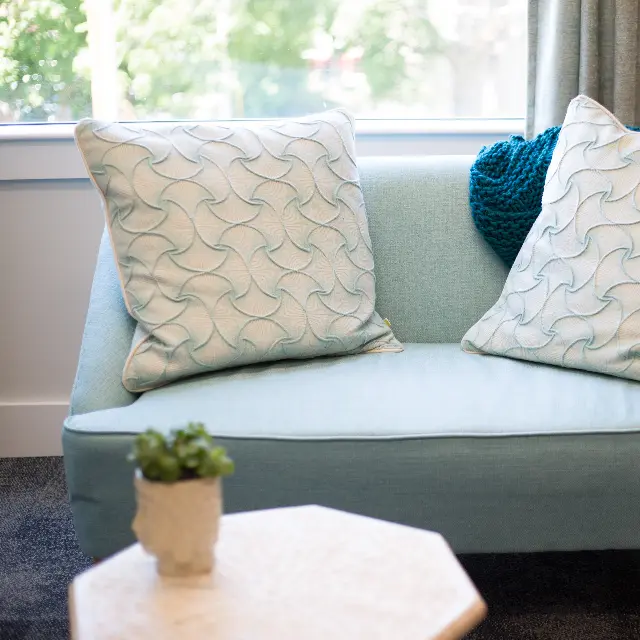 Pale blue loveseat